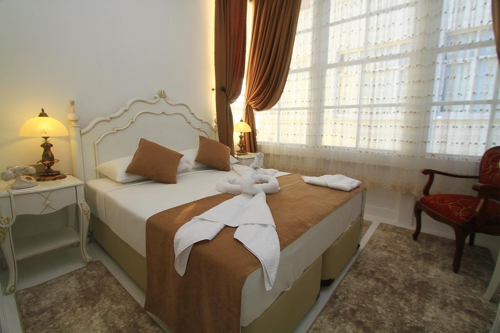 Dantela Butik Hotel Кешме Номер фото